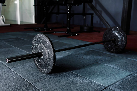 Barbell On Floor In Gym