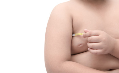 obese fat boy put medical thermometer to an armpit