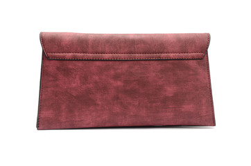 Burgundy leather clutch isolated on white
