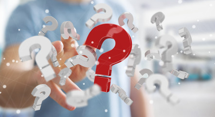 Businessman using 3D rendering question marks