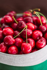 Fresh red cherries in bucket
