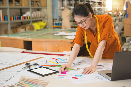 Chinese design student thinks how to drawing