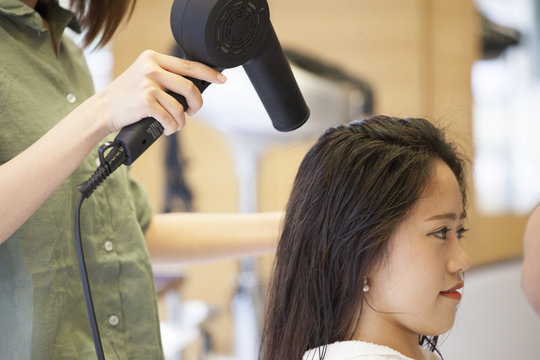 Women are doing hair care at hairdressing room