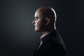 Profile of white bald man
