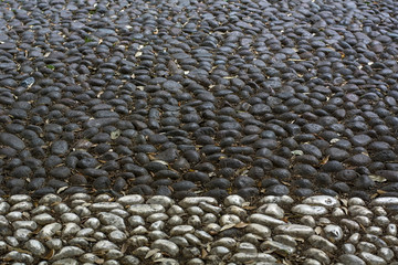 Black and white stone pavement as background