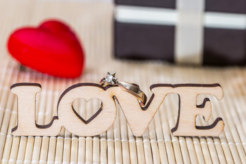 wooden text love with gift box. valentines concept