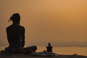 Yogi on the shore of the gang