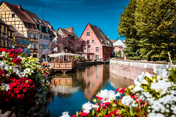 Beautiful town of Colmar in Alsace province of France on a summer sunny day - obrazy, fototapety, plakaty