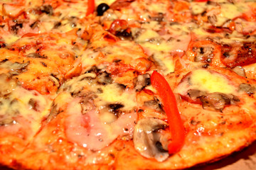 Obraz na płótnie Canvas Pizza with tomato, salami and olives