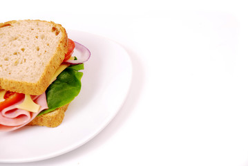 Healthy ham sandwich with cheese, tomatoes on white background