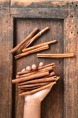 Cinnamon sticks on hand for background