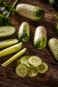 Slices and whole cucumbers