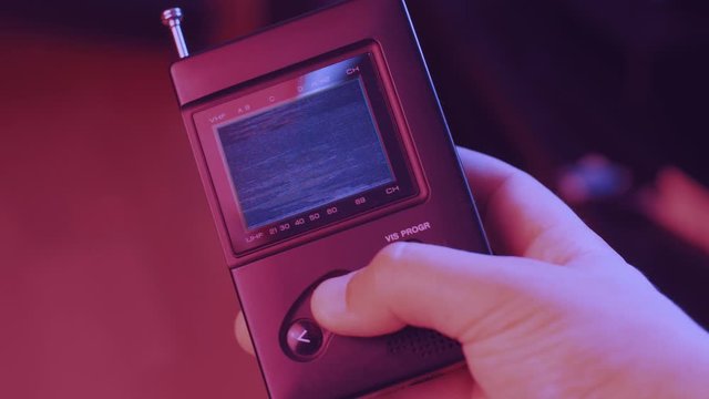 Cinemagraph Retro 80s Style Portable Tv Channel Surfing