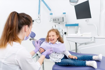 Smiling little patient at dentist