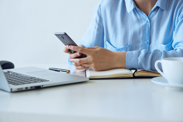 Fototapeta premium Woman working behind the phone, business woman working, business woman at the office