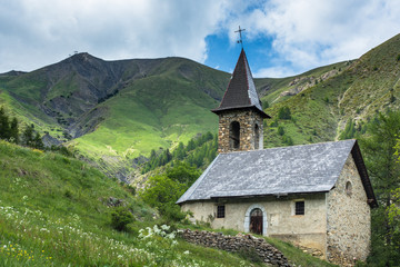 Fototapeta na wymiar Lonely church in picturesque spring Alps,France