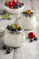 Chia seed pudding with fresh berries, healthy breakfast concept, selective focus