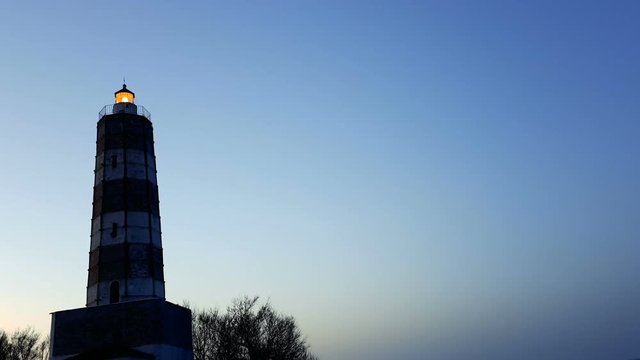 lighthouse with rotating spotlight during sunset shabla bulgaria 1080p
