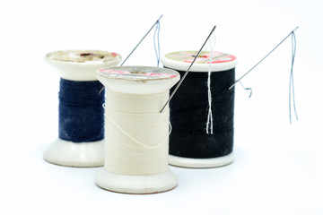 Spool of thread isolated on white background