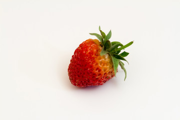 One ripe strawberry berry