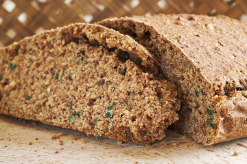 Homemade chrono diet bread on wooden cutting board