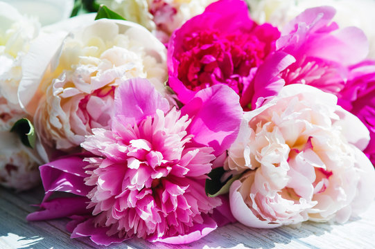 Beautiful and tender pink and ivory peony flower bouquet