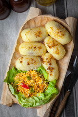 Potato dumplings stuffed with minced meat.