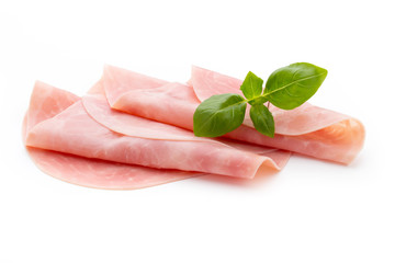 Thin slices of ham on white background.