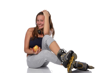 The beautiful girl in rollerskates