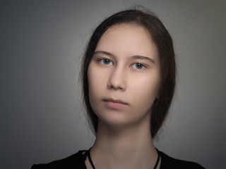 Fototapeta premium Portrait of a girl. The unusual beauty. Natural face without makeup