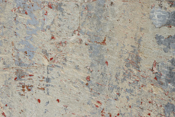 Fototapeta premium Wall fragment with scratches and cracks