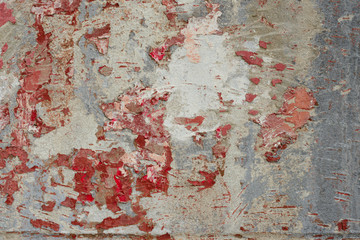 Wall fragment with scratches and cracks