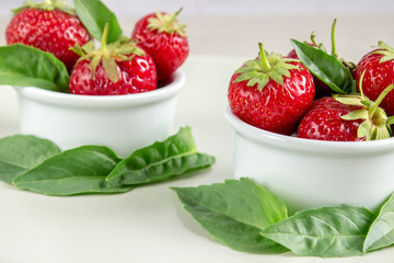 Ripe strawberries anf mint in a bowl
