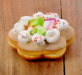 Beautiful whole Cake isolated on wood background