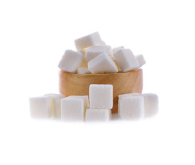 sugar cube in wooden  bowl on white background