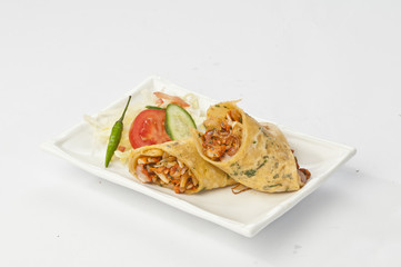 chicken kathi rolls with fresh salad and green chilly