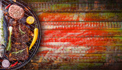 Obraz na płótnie Canvas Barbecue grill with beef steaks, close-up.