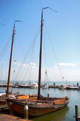 Moody shots of boats tied alongside the moorings at Volendam, Holland