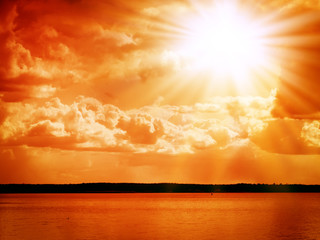 Obraz na płótnie Canvas Red sunset over the sea