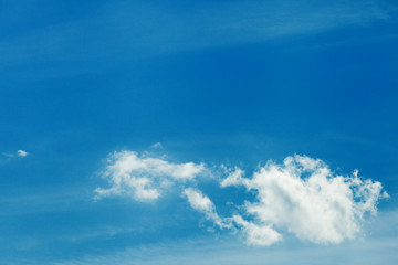 Naklejka na ściany i meble Clouds against the blue sky