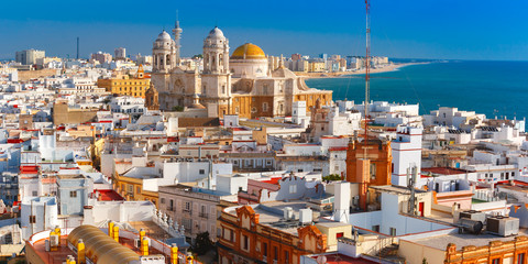 Aerial panoramic view of the old city rooftops and Cathedral de Santa Cruz in the morning from...