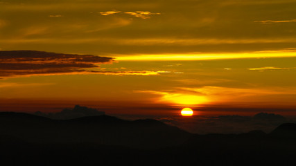 Sunrise landscape over the Adams peak aka Sri-Pada in Sri-Lanka