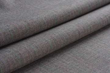Folds of gray woolen cloth