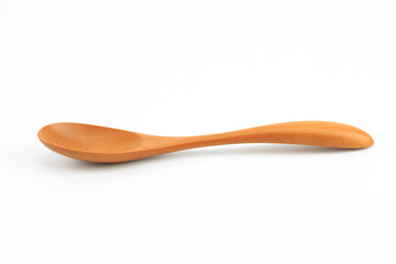 Brown wooden spoon, white background