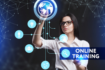 The concept of business, technology, the Internet and the network. A young entrepreneur working on a virtual screen of the future and sees the inscription: Online training