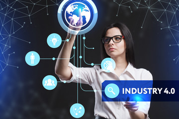 The concept of business, technology, the Internet and the network. A young entrepreneur working on a virtual screen of the future and sees the inscription: Industry 4.0