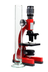Microscope for biology and flasks on white background