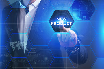 Business, Technology, Internet and network concept. Young businessman working on a virtual screen of the future and sees the inscription: New product