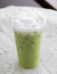 Green tea is cool in clear glass.
