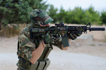 Fototapeta premium special forces army soldier M 4 with silence